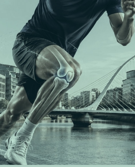 A sprinting athlete with the knee joint highlighted