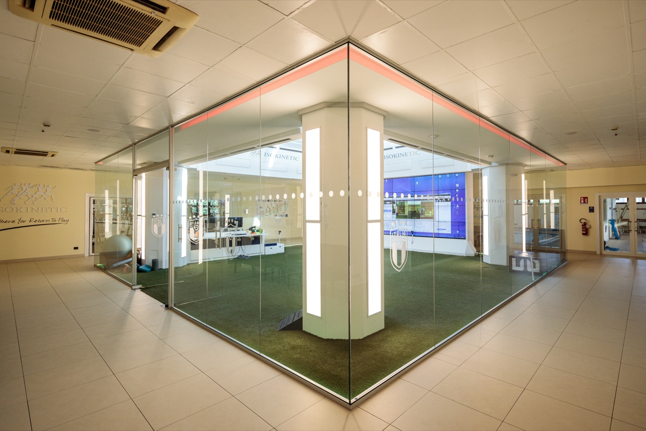 The glass-walled movement analysis room on artificial turf